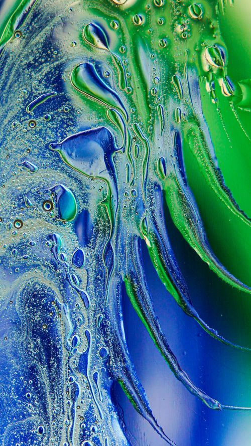 Free Colorful abstract image with blue and green liquid patterns creating a mesmerizing flow. Stock Photo