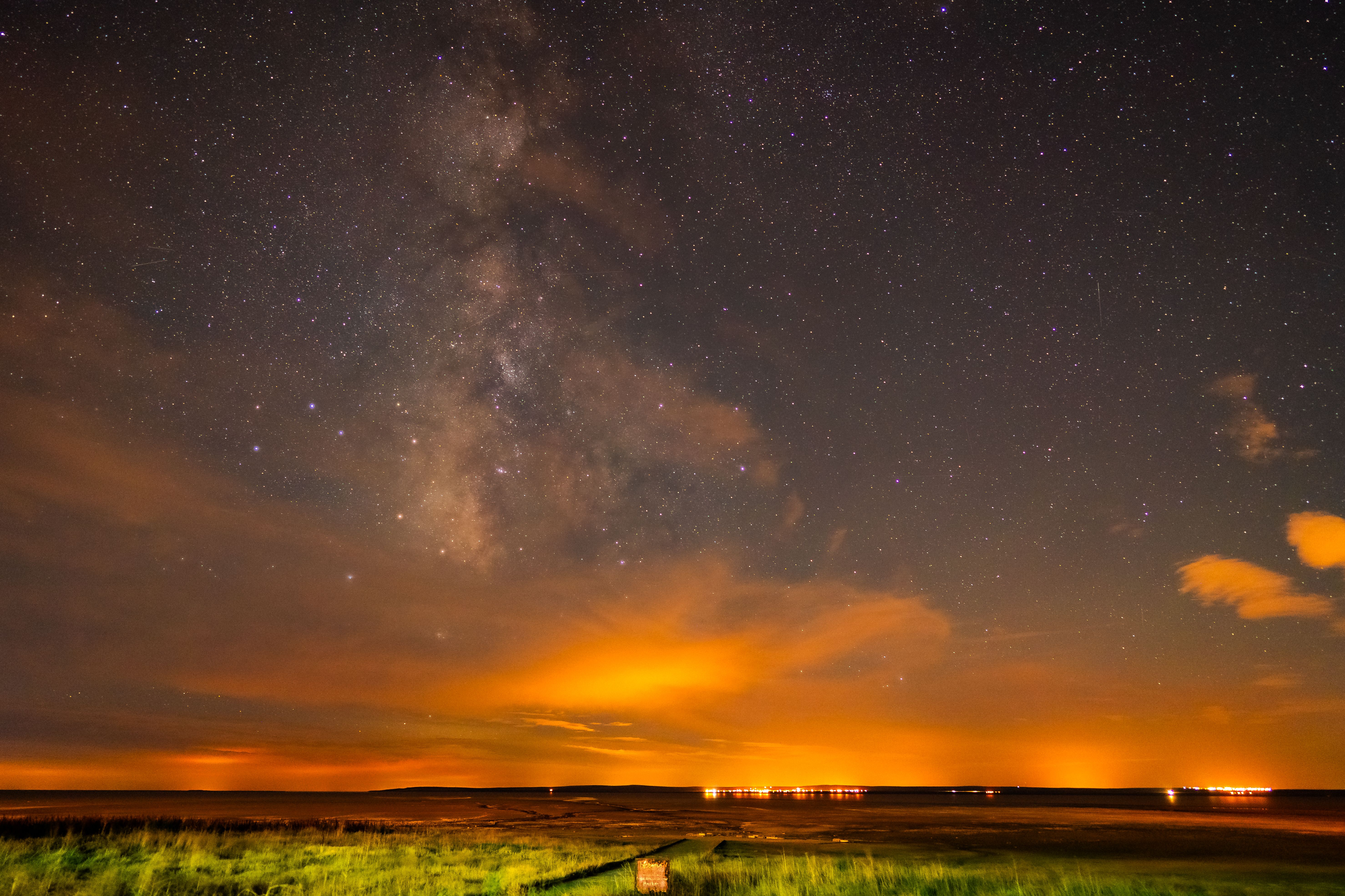 Breathtaking view of the Milky Way galaxy over a serene landscape in Türkiye at night.