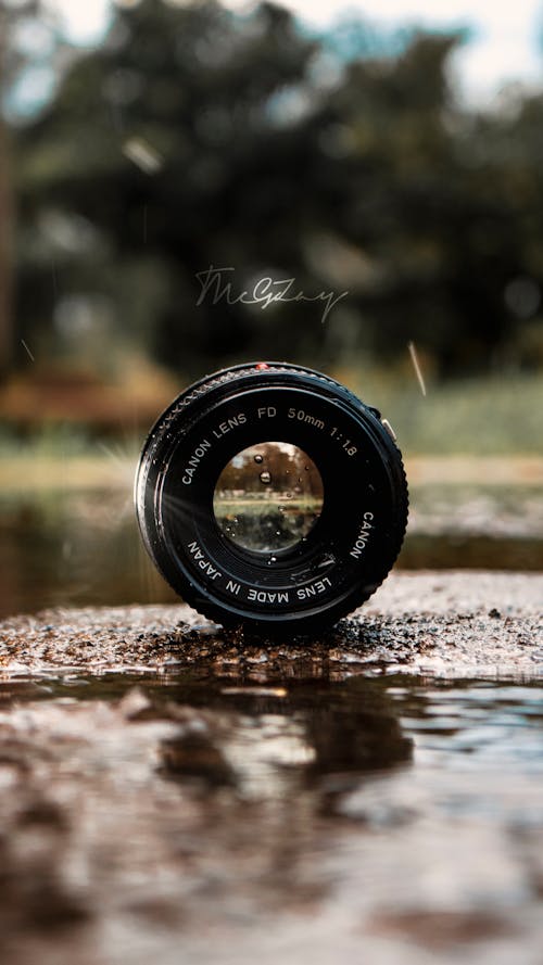 Free stock photo of camera lens, canon, water reflection Stock Photo
