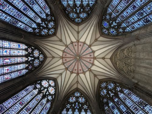 Free Stunning stained glass ceiling detail inside York Minster, showcasing Gothic architecture. Stock Photo
