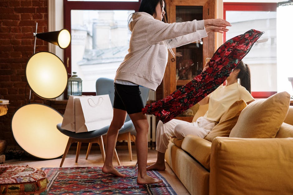 best willis tx registered nurse - Two women enjoy a fashion fitting session in a cozy home interior, surrounded by stylish decor.