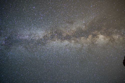 Free Captivating night sky view of the Milky Way galaxy filled with countless stars. Stock Photo
