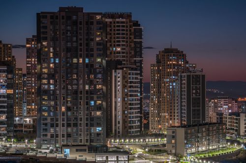 Free A captivating night scene of illuminated high-rise buildings in Ankara, Türkiye, highlighting urban architecture. Stock Photo