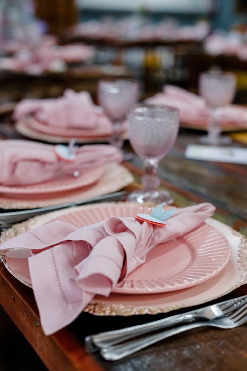 Free Pink Ceramic Plate With Stainless Cutlery Stock Photo