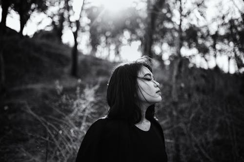 Grayscale Photo Of Woman In Black Shirt