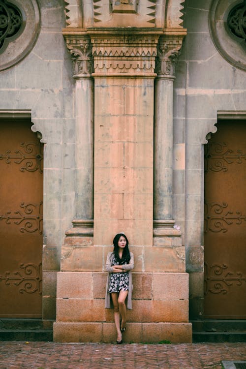 Woman Leaning On Wall