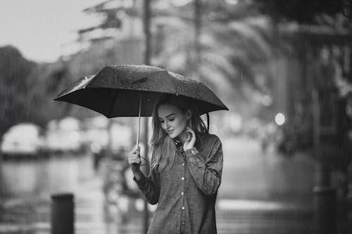 Woman Holding An Umbrella