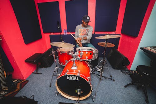 Free Man Playing The Drums Stock Photo