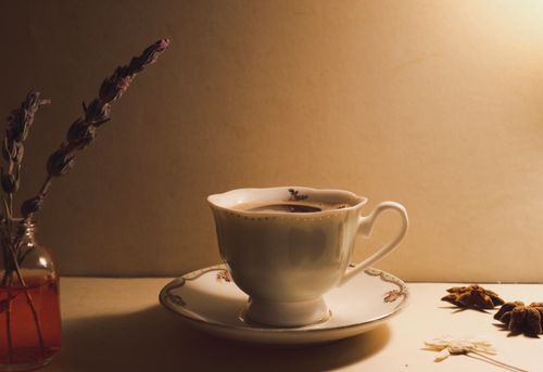 Free Aesthetic still life of a tea cup with lavender and spices, creating a cozy atmosphere. Stock Photo
