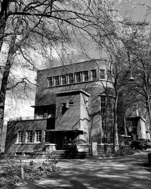 Free Black and white photo of an Art Deco building in Arnhem, showcasing intricate architectural design. Stock Photo