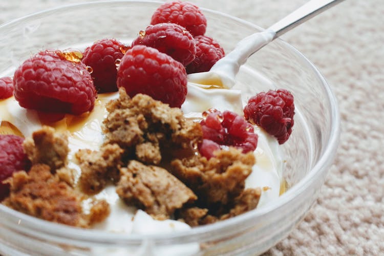 Delicious Greek Yogurt With Biscuit Crumb And Fresh Raspberries