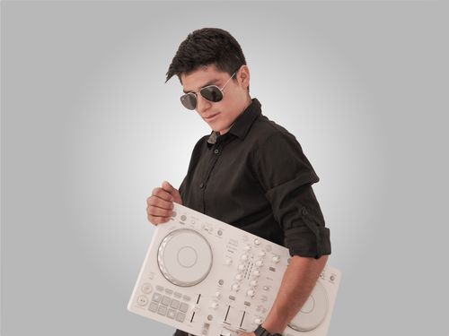 Free Stylish young DJ in dark outfit holding a DJ mixer in studio setting. Stock Photo