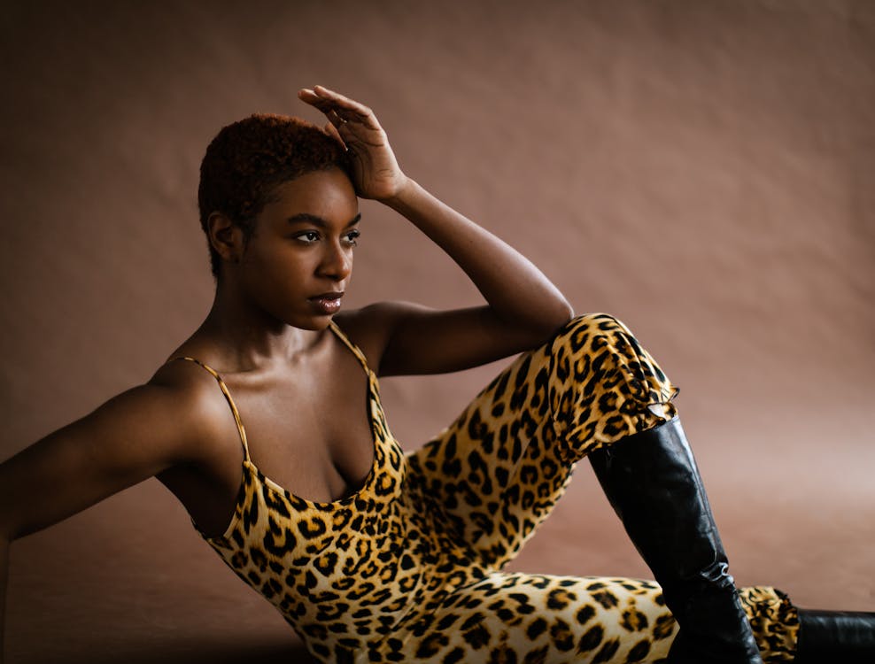 Woman in Leopard Print Jumpsuit