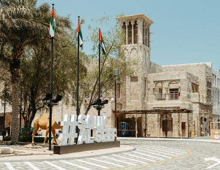 Historic Al Seef area in Dubai showcasing traditional architecture and vibrant street scene.