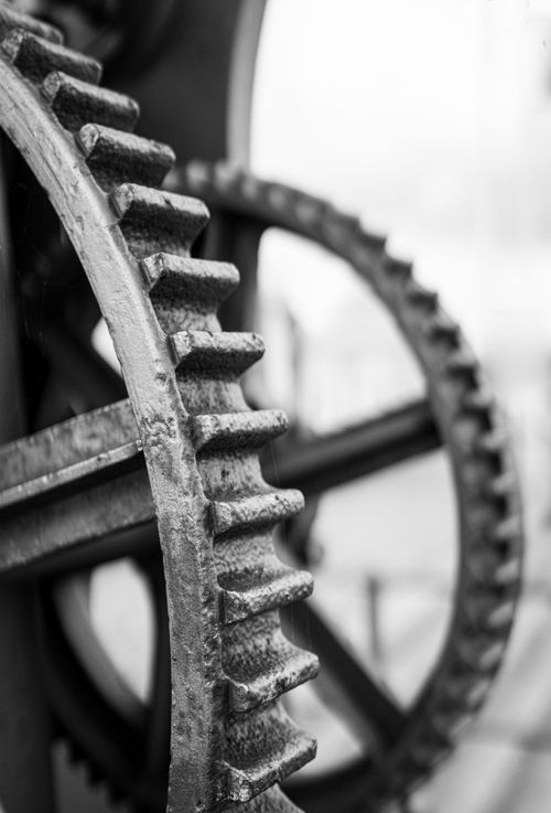 Free Close-up view of interlocking industrial gears showcasing vintage machinery design. Stock Photo