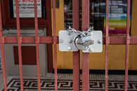 Red Metal Gate With Padlock