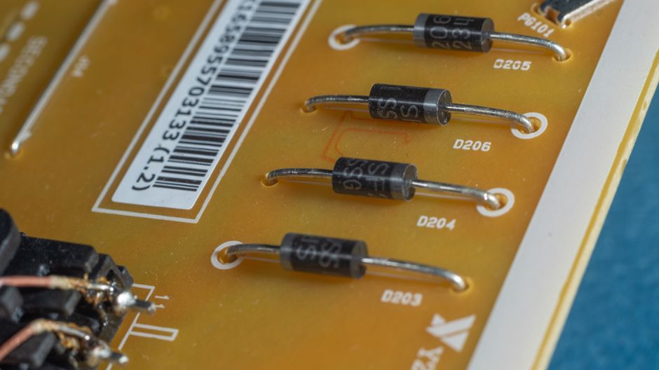 Macro shot of diodes and circuit board details emphasizing technology and design.