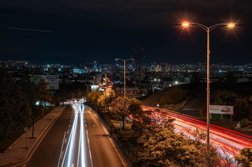 Free Dynamic long exposure capturing Ankara's city lights and bustling streets at night. Stock Photo