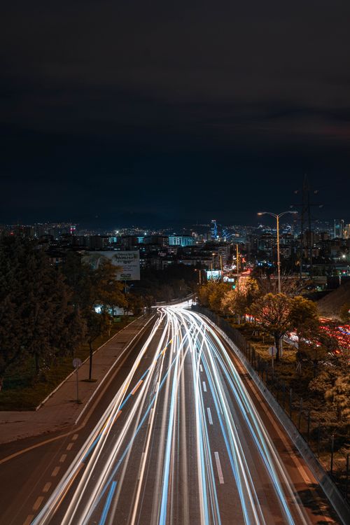 Free Dynamic long exposure of car lights on a busy Ankara street at night, showcasing the vibrant city life. Stock Photo
