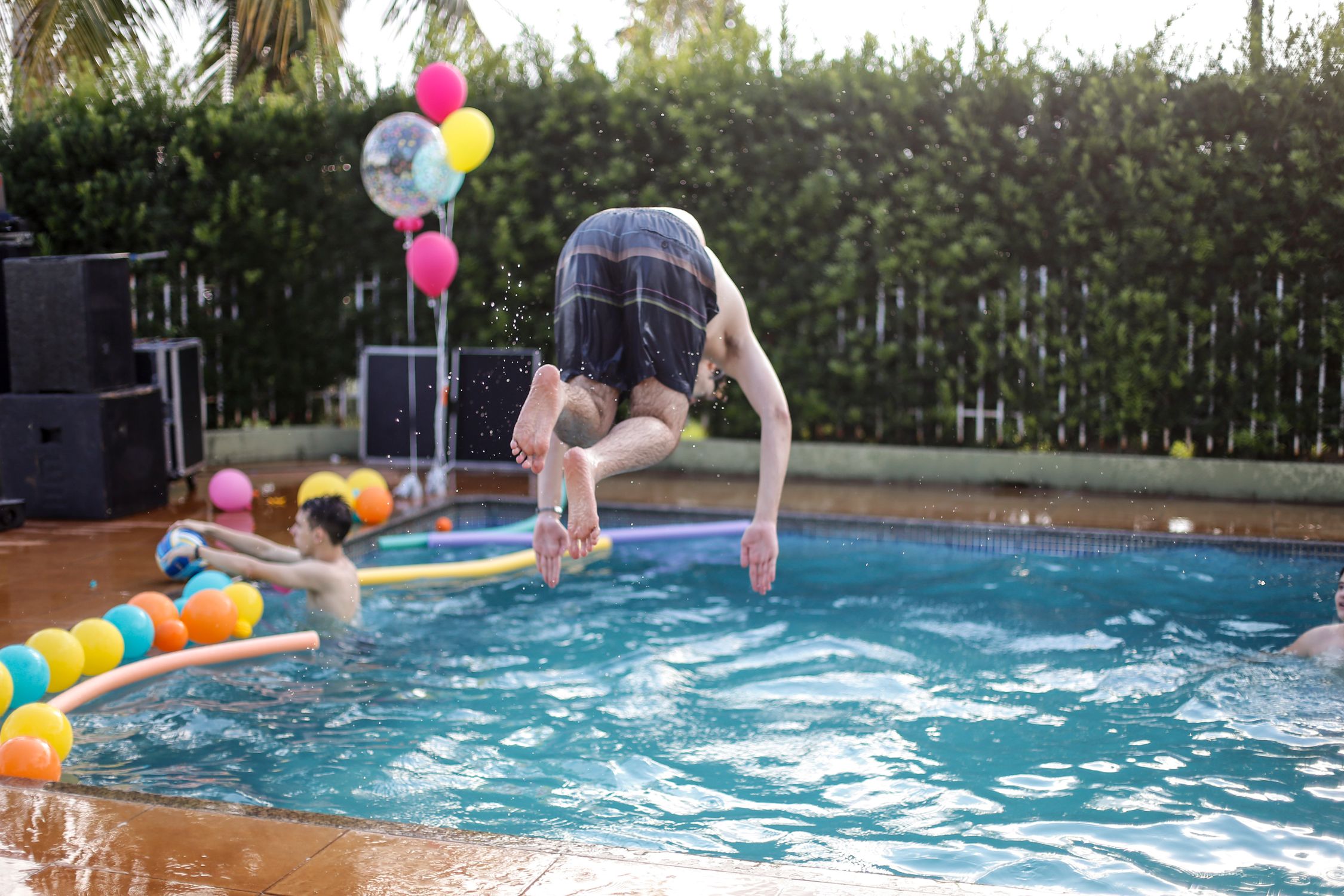 Man Jumping Into The Pool · Free Stock Photo