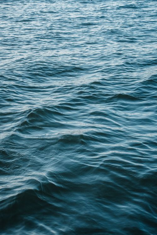 Free Captivating view of tranquil ocean waves near Tadoussac, Québec, Canada. Stock Photo