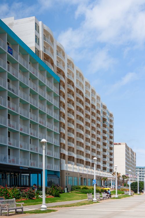 Free A view of Virginia Beach oceanfront hotels with clear blue skies and summer vibes. Stock Photo