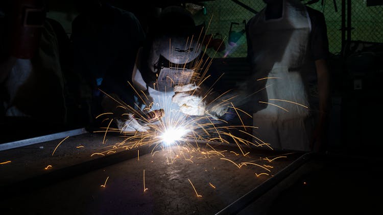 Photo Of A Welder At Work