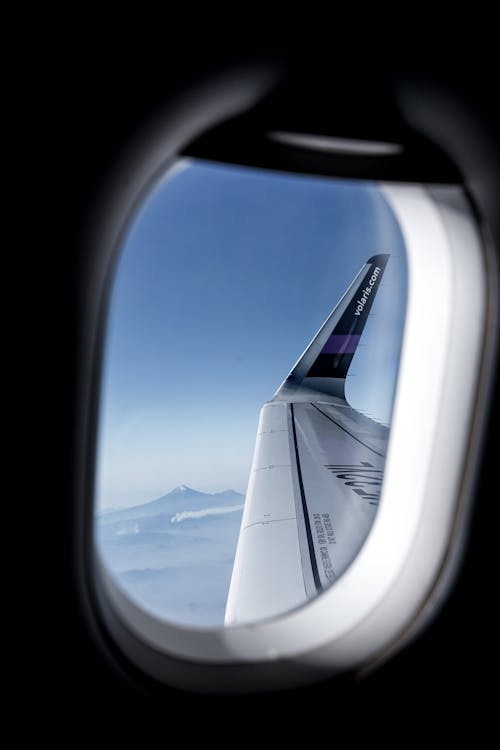 Free Airplane Wing Seen from Window Stock Photo