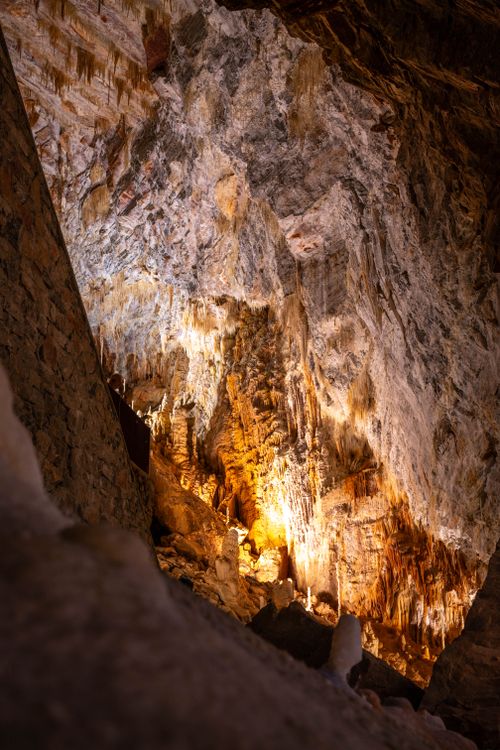 Free Stunning geological formations illuminated inside Cabrespine Cave, Occitanie, France. Stock Photo