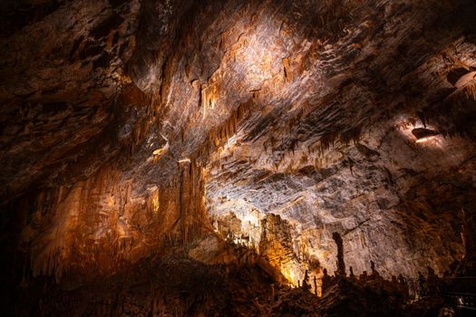 Explore breathtaking stalactites and stalagmites in Cabrespine Cave, France.