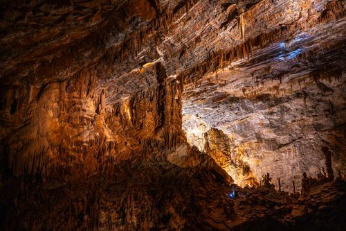 Free Dramatic view of stalactites and stalagmites inside a cave in Cabrespine, France, showcasing natural rock formations. Stock Photo