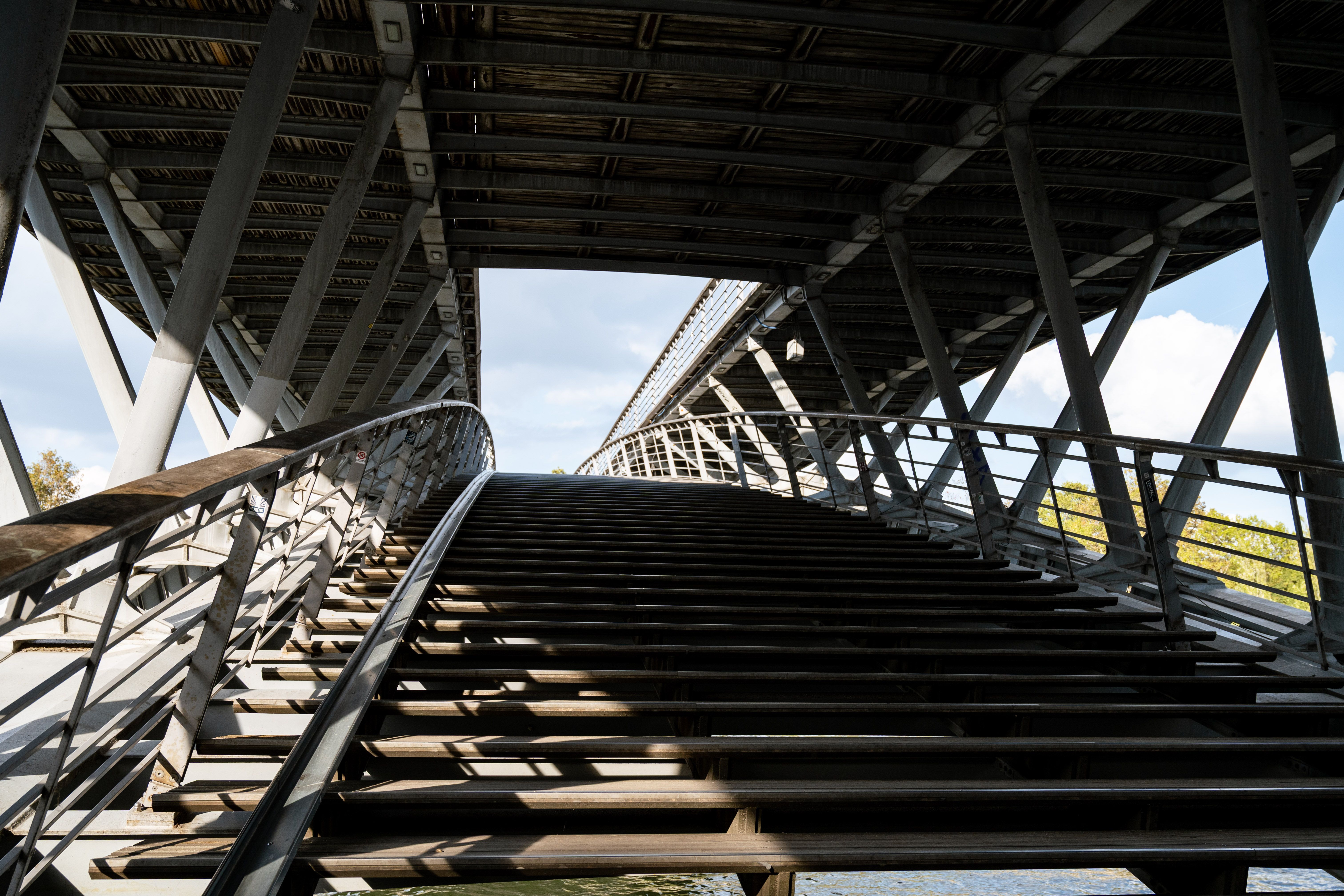 A striking view of Passerelle Simone de Beauvoir in Paris showing its modern steel structure.