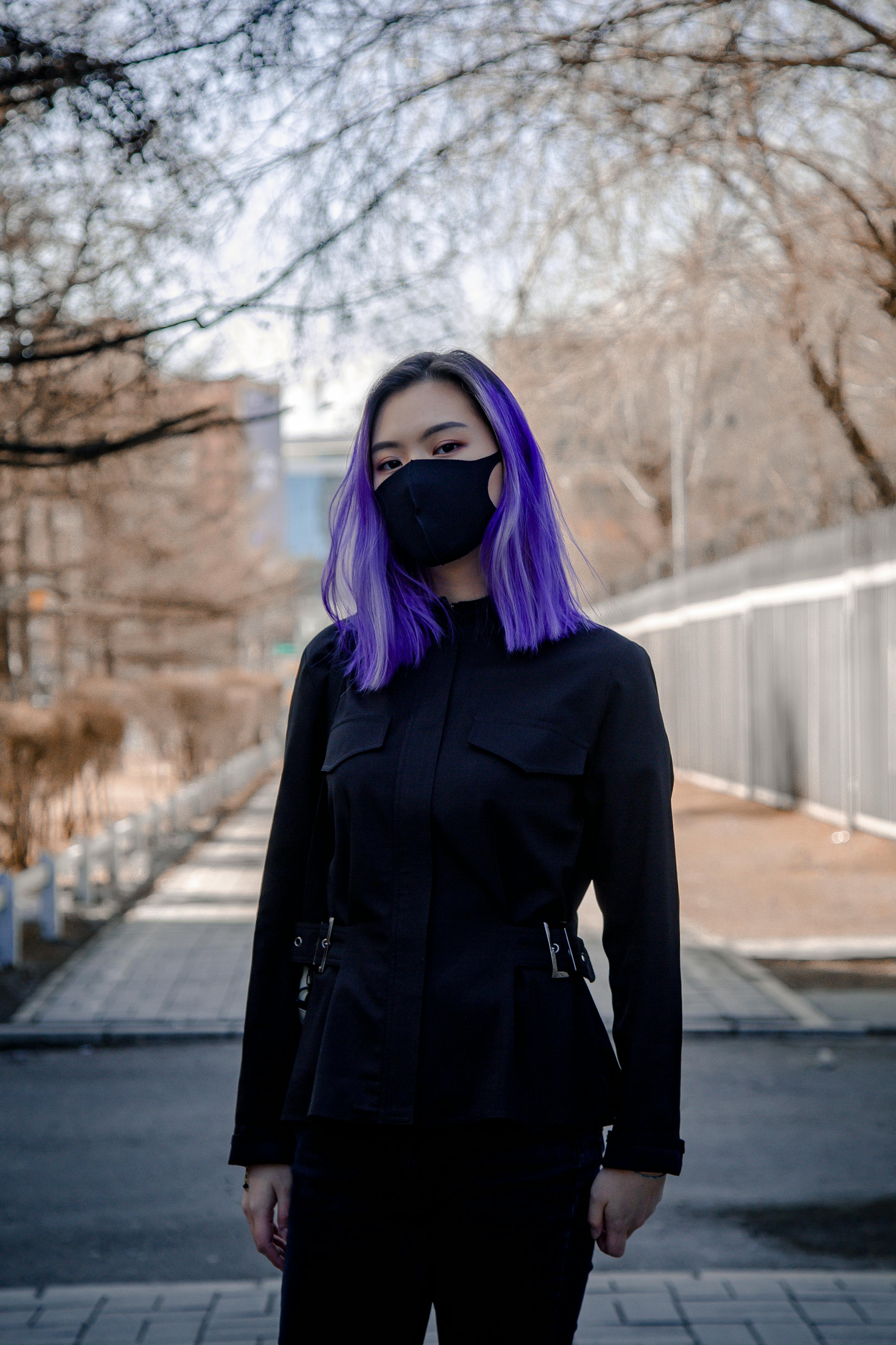 Unrecognizable ethnic woman in mask during COVID 19 ...