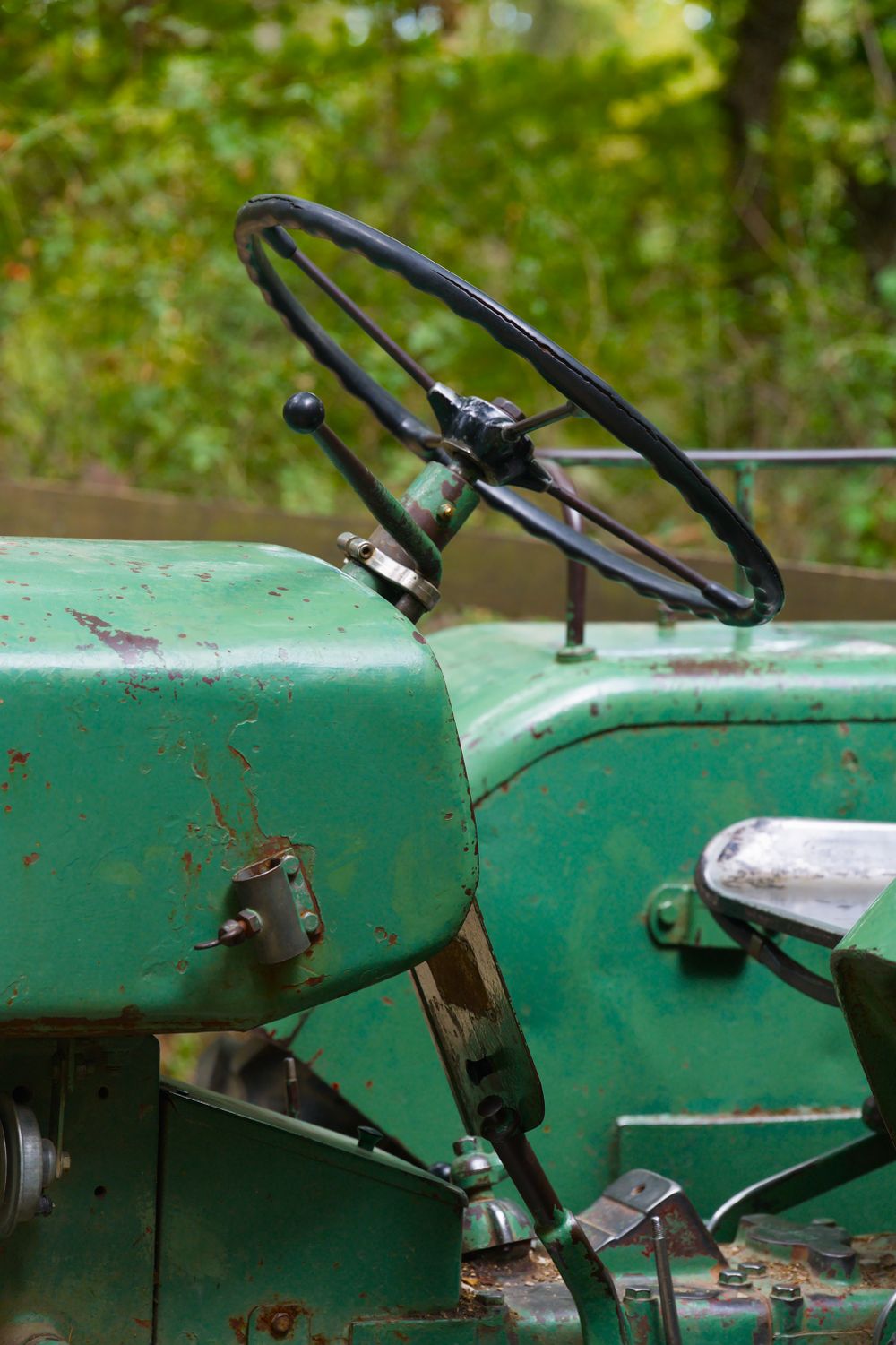 Steering wheel and dash of an old tractor