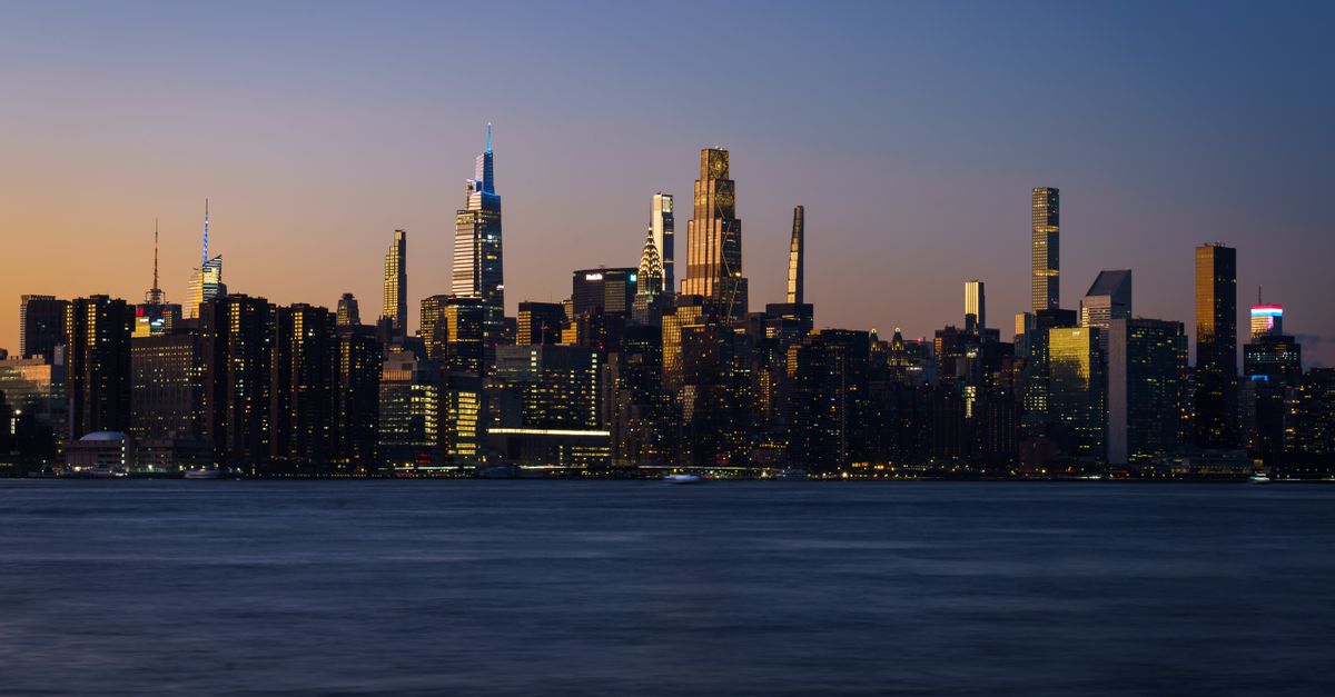 Stunning view of the New York City skyline at twilight, highlighting iconic skyscrapers.