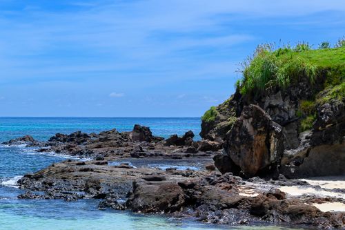 Free Stunning rocky coastline and clear blue waters of West Nusa Tenggara in Indonesia. Stock Photo