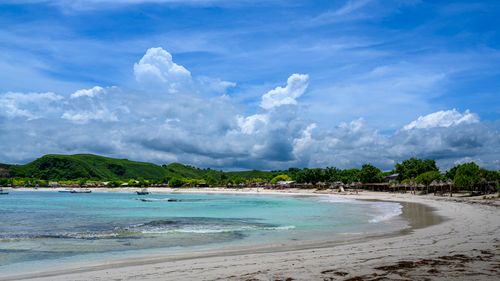 Free Stunning seascape of a tranquil beach in West Nusa Tenggara, Indonesia, with clear turquoise waters. Stock Photo