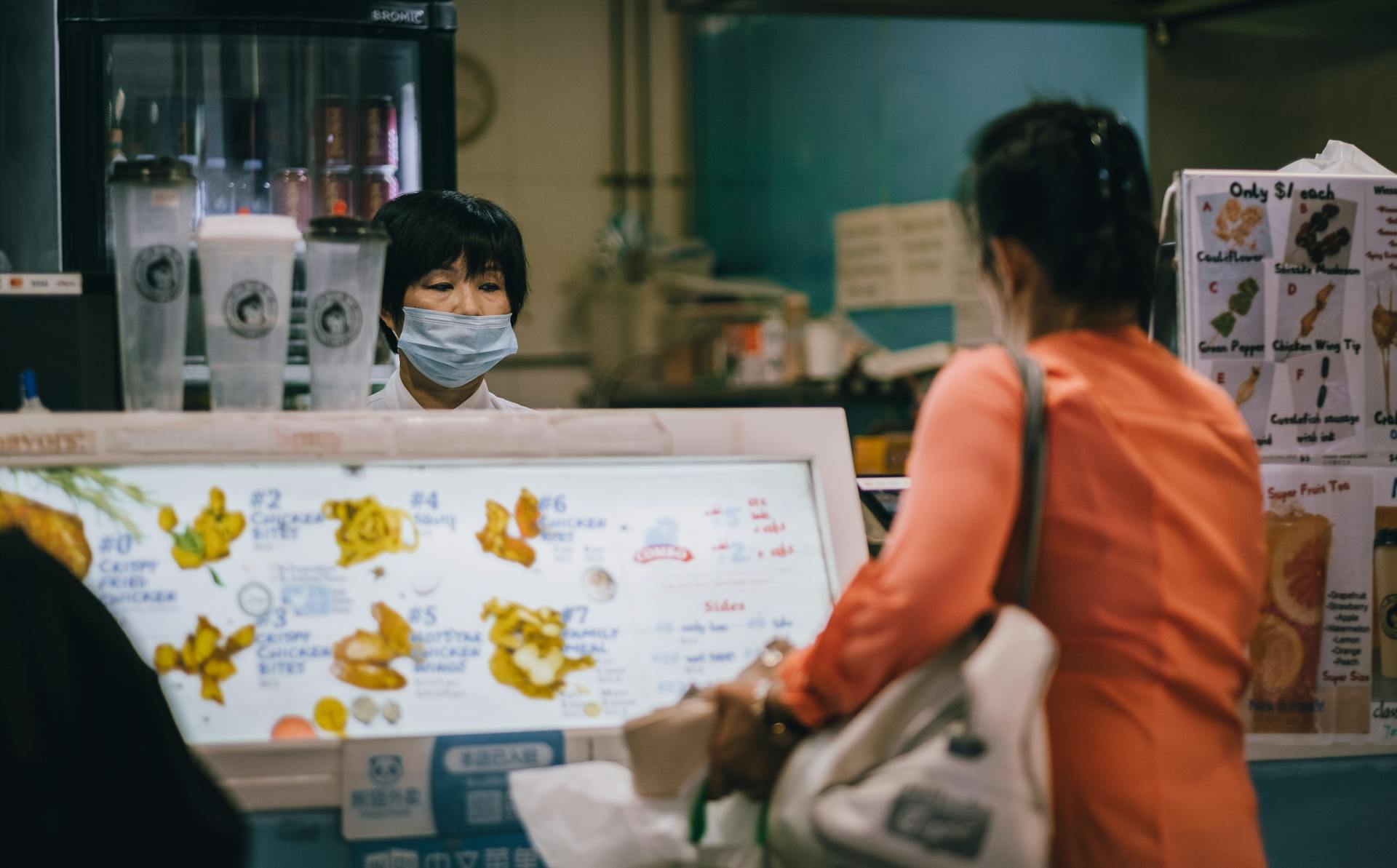 Woman Buying Some Snacks