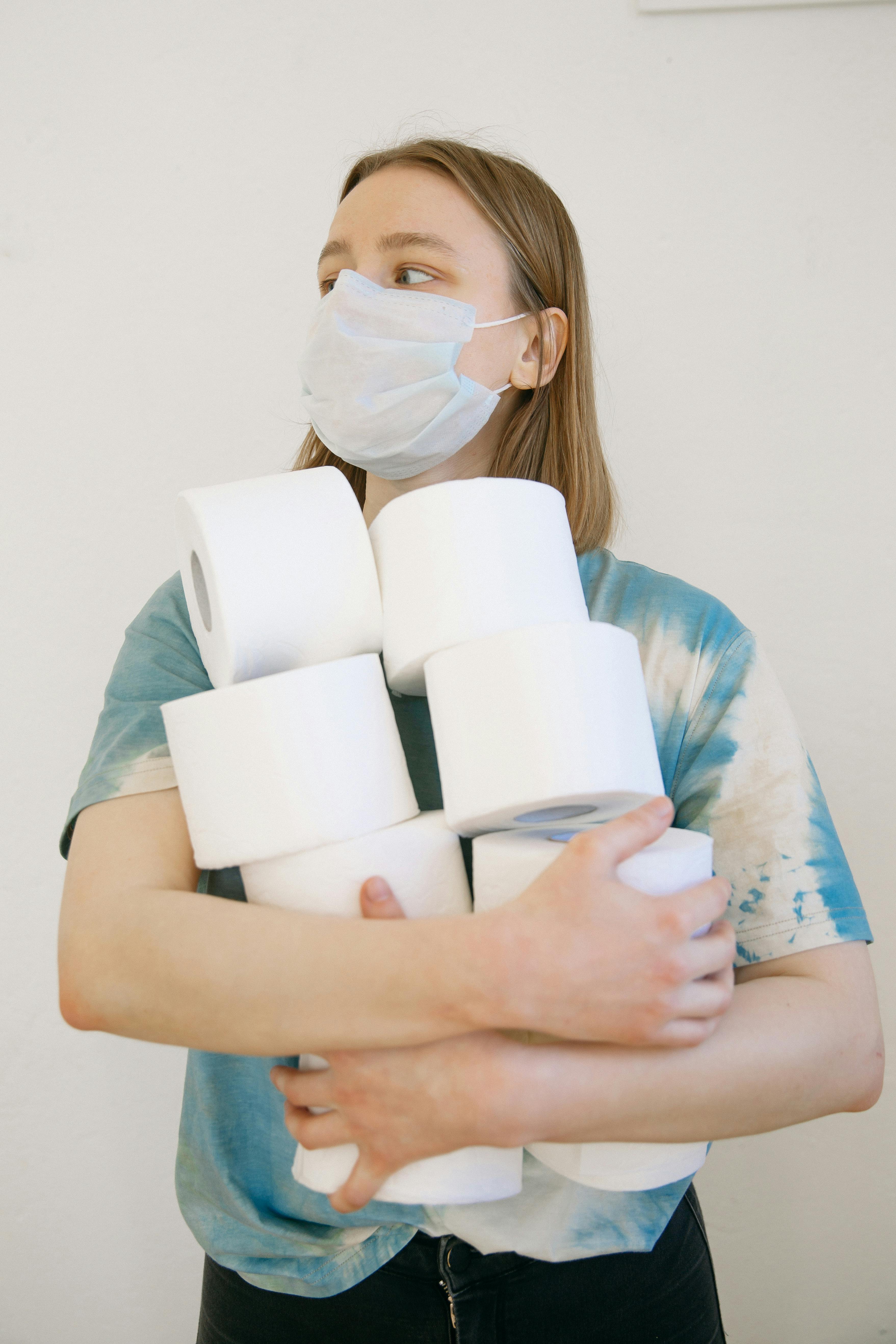 woman hoarding tissue paper