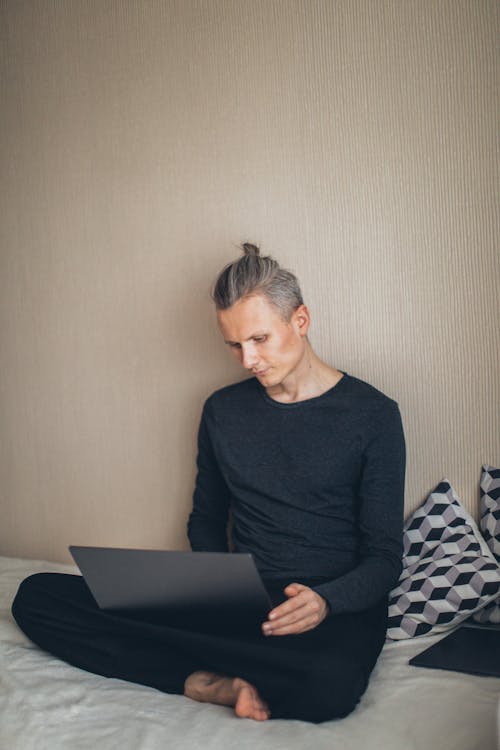 Free Man in Black Long Sleeves Shirt Using Laptop Stock Photo