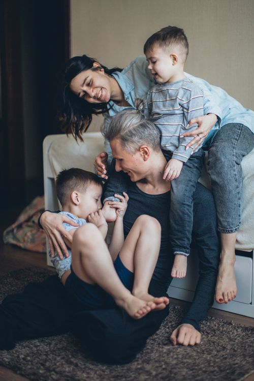 Free Joyful family spending quality time together indoors, embracing love and happiness. Stock Photo