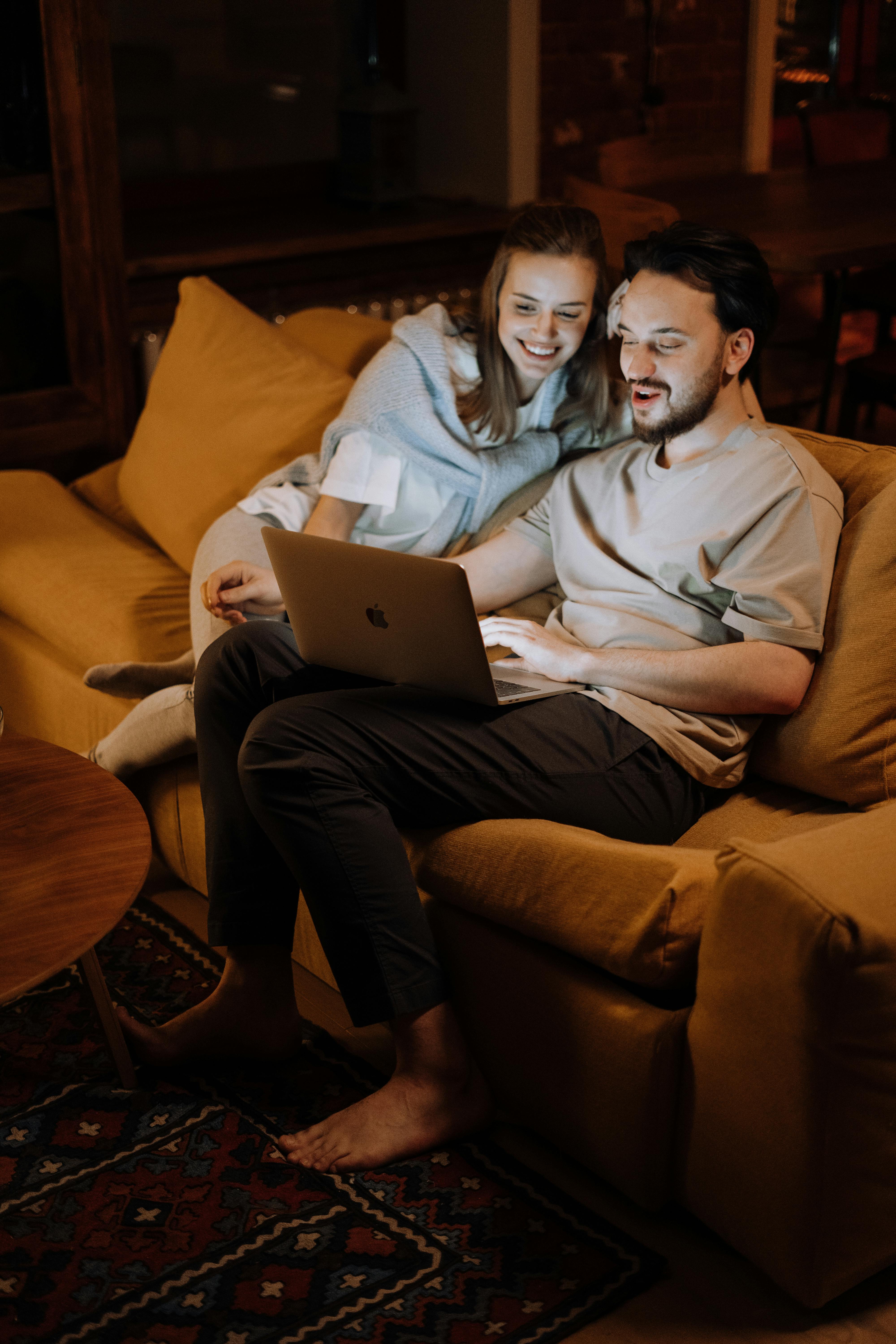 couple love laptop typing