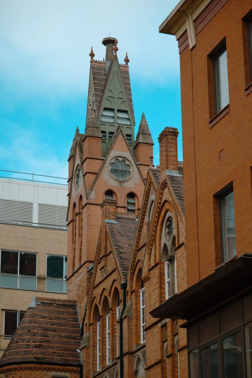 Free A beautiful historic building in Birmingham with Gothic architectural elements. Stock Photo