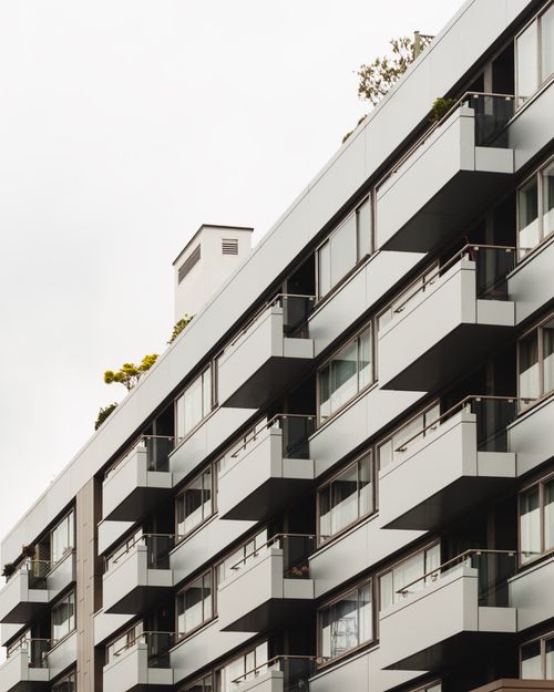 Free Geometric patterns on a modern apartment building facade in London with balconies. Stock Photo