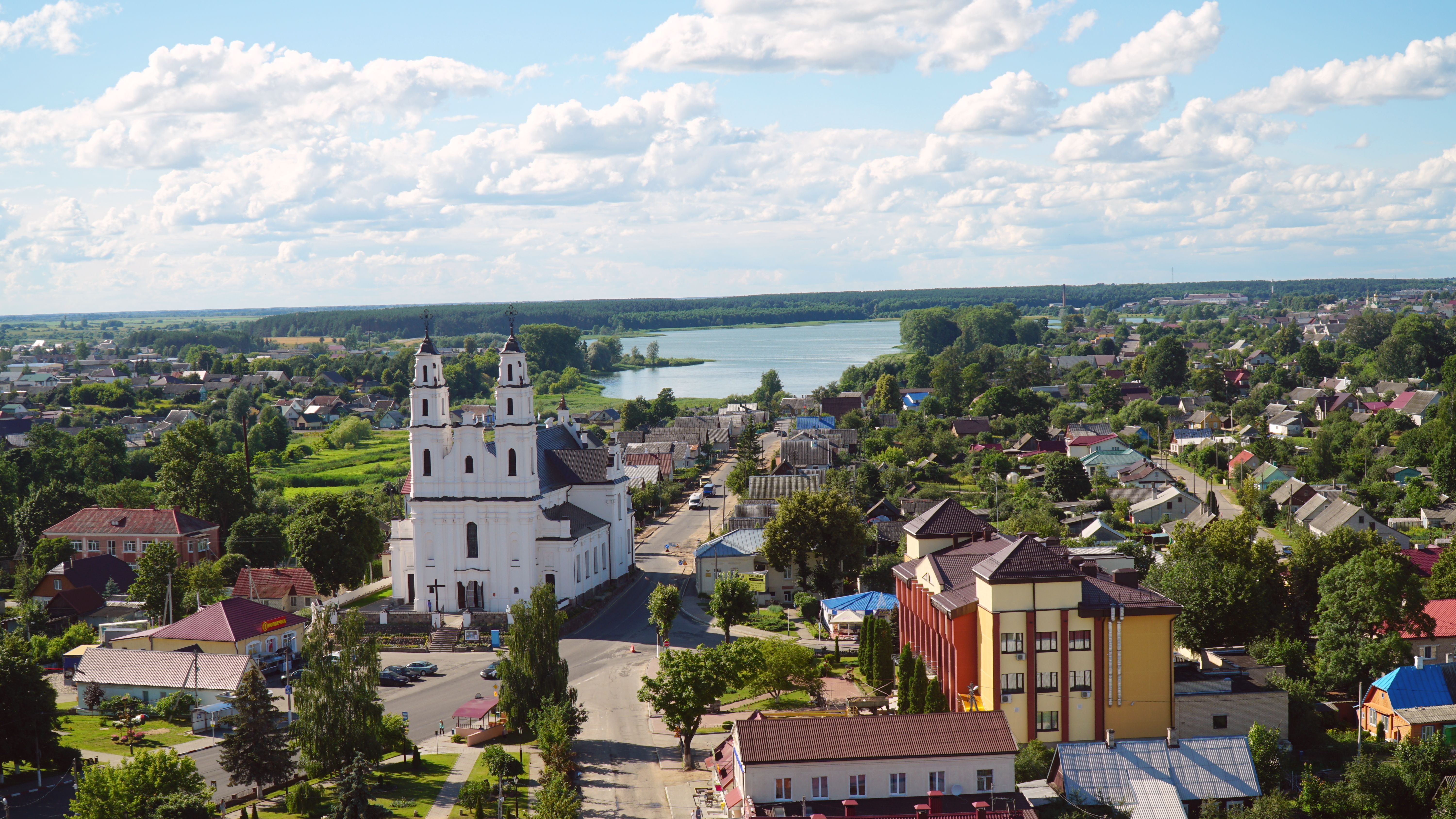 Aerial view of Polotsk featuring a historic church and scenic landscape.