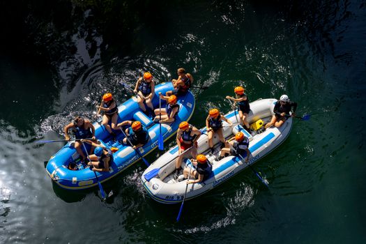 Group enjoying a thrilling whitewater rafting experience in Ostrožac, Bosnia.