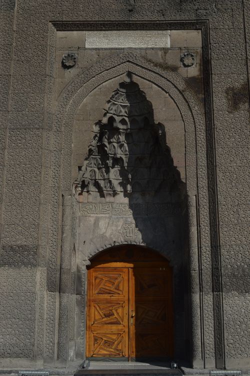Free Intricately carved stone doorway at a historic building in Kayseri, Türkiye, showcasing traditional architecture. Stock Photo