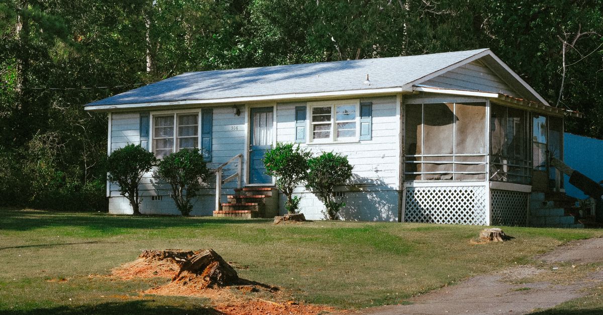 Small suburban house surrounded by greenery in Atlanta, Georgia.