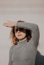 Woman Covering Eyes From Sun