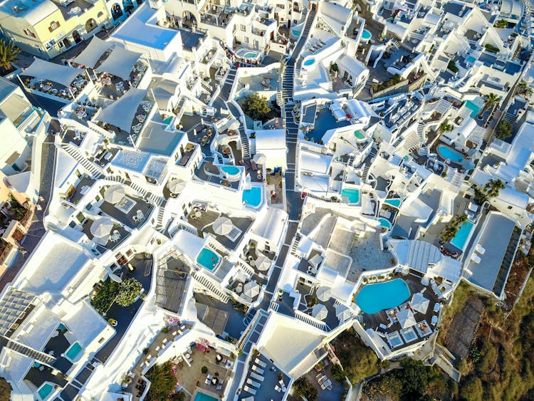 Drone Shot Of Buildings And Swimming Pools